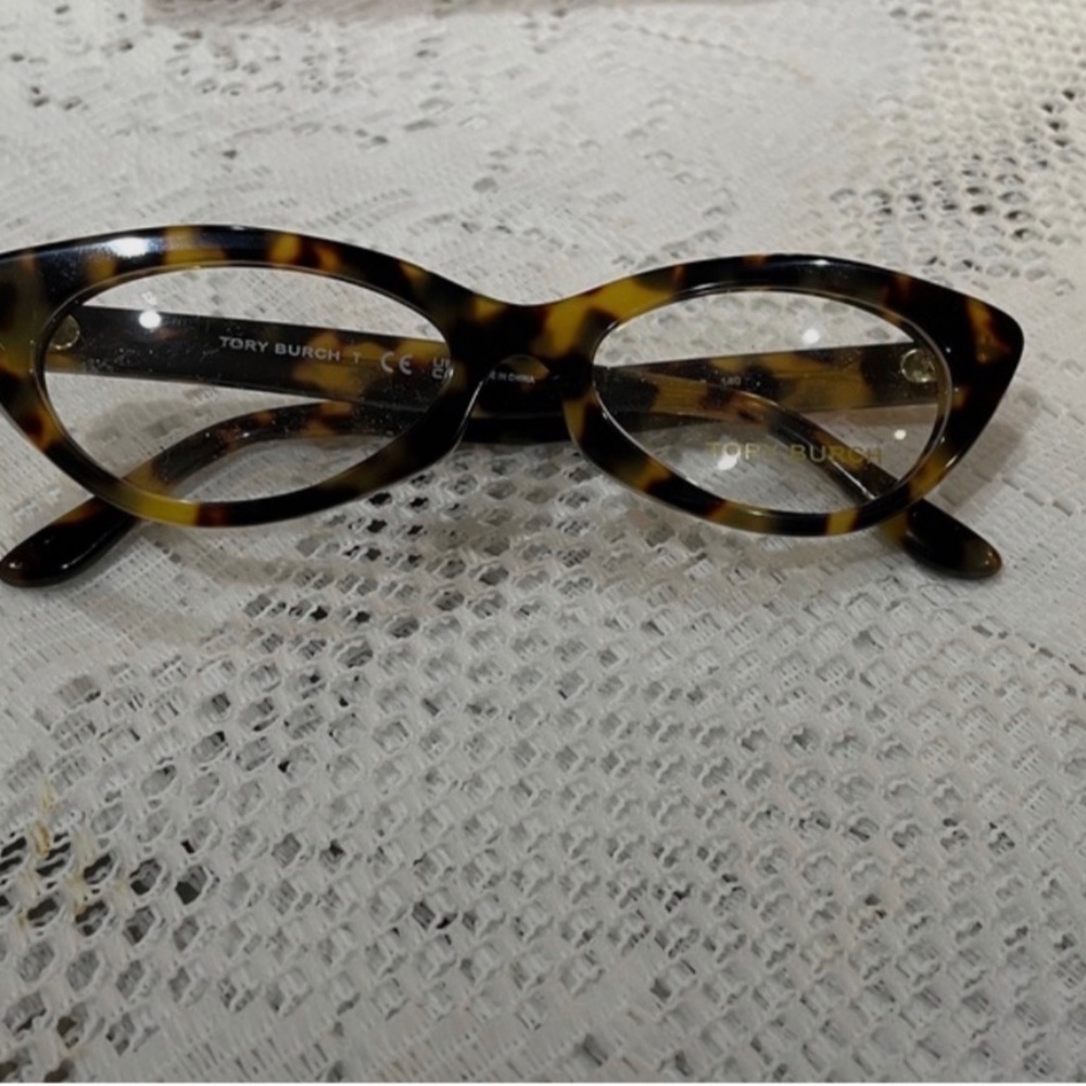 Tory Burch Eyeglasses and Vibrant Orange Clutch